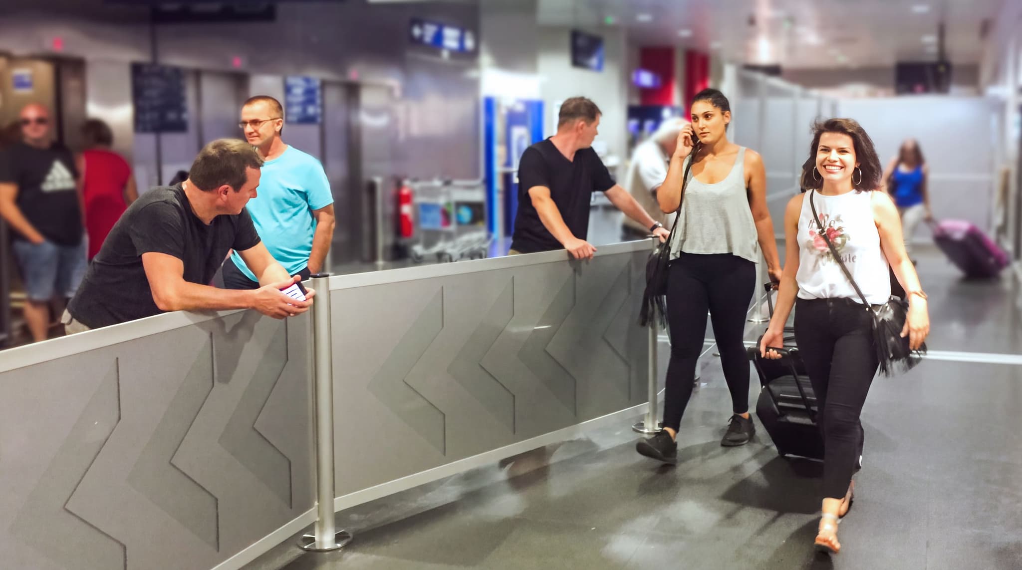 Airport barriers and partition walls at the immigration checkpoint exit
