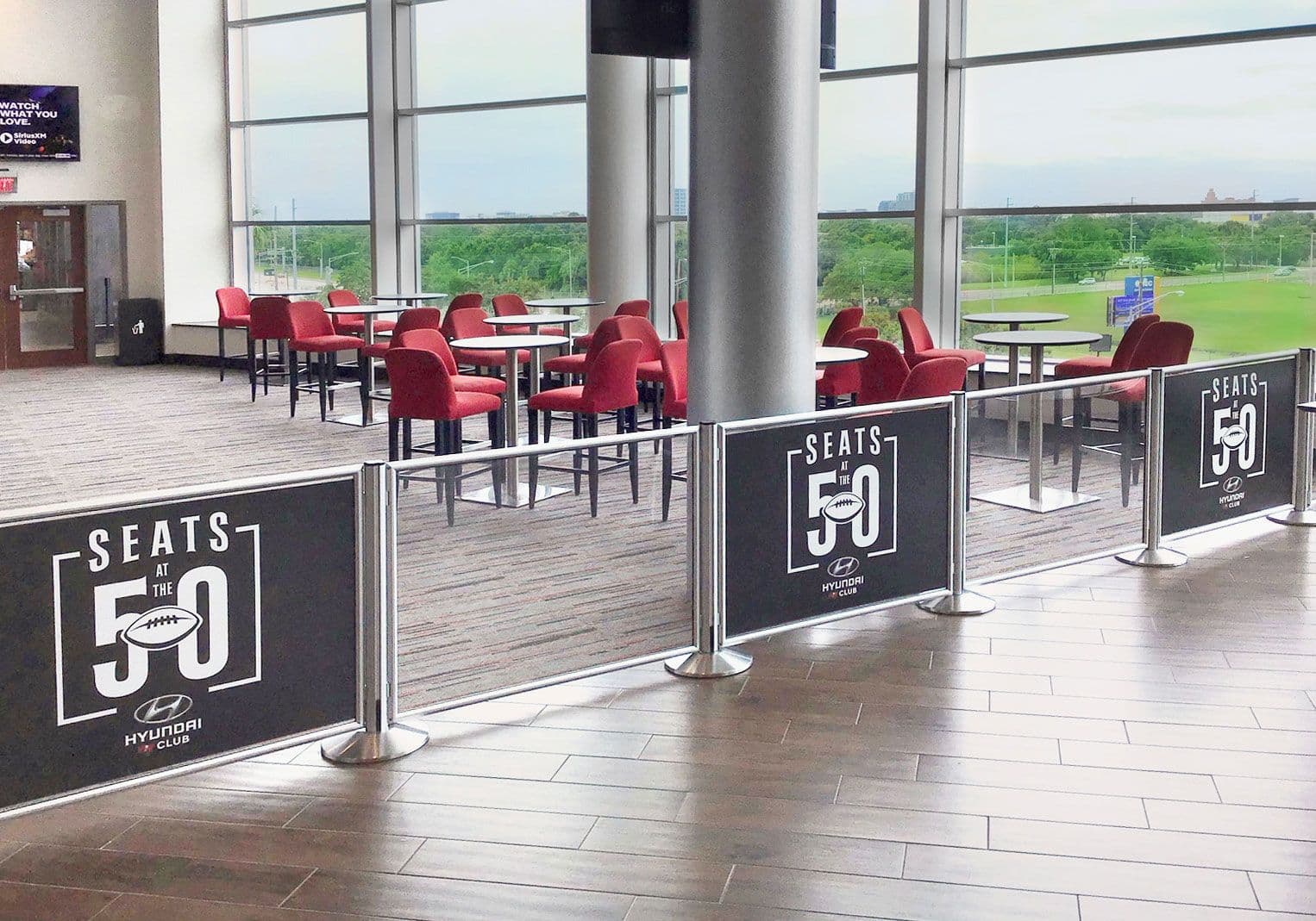 Post & panel partition wall at a stadium