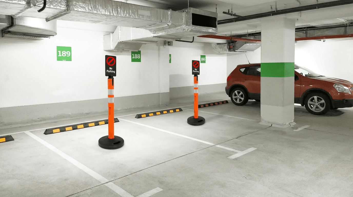 Delineator in a parking garage with signage