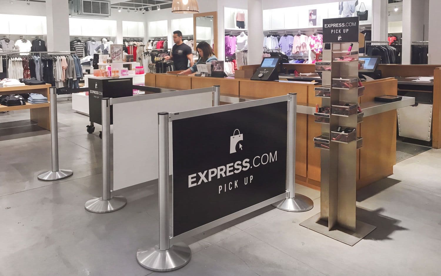 Rigid Rail Barrier Signage in the Online Pick Up Line at Express