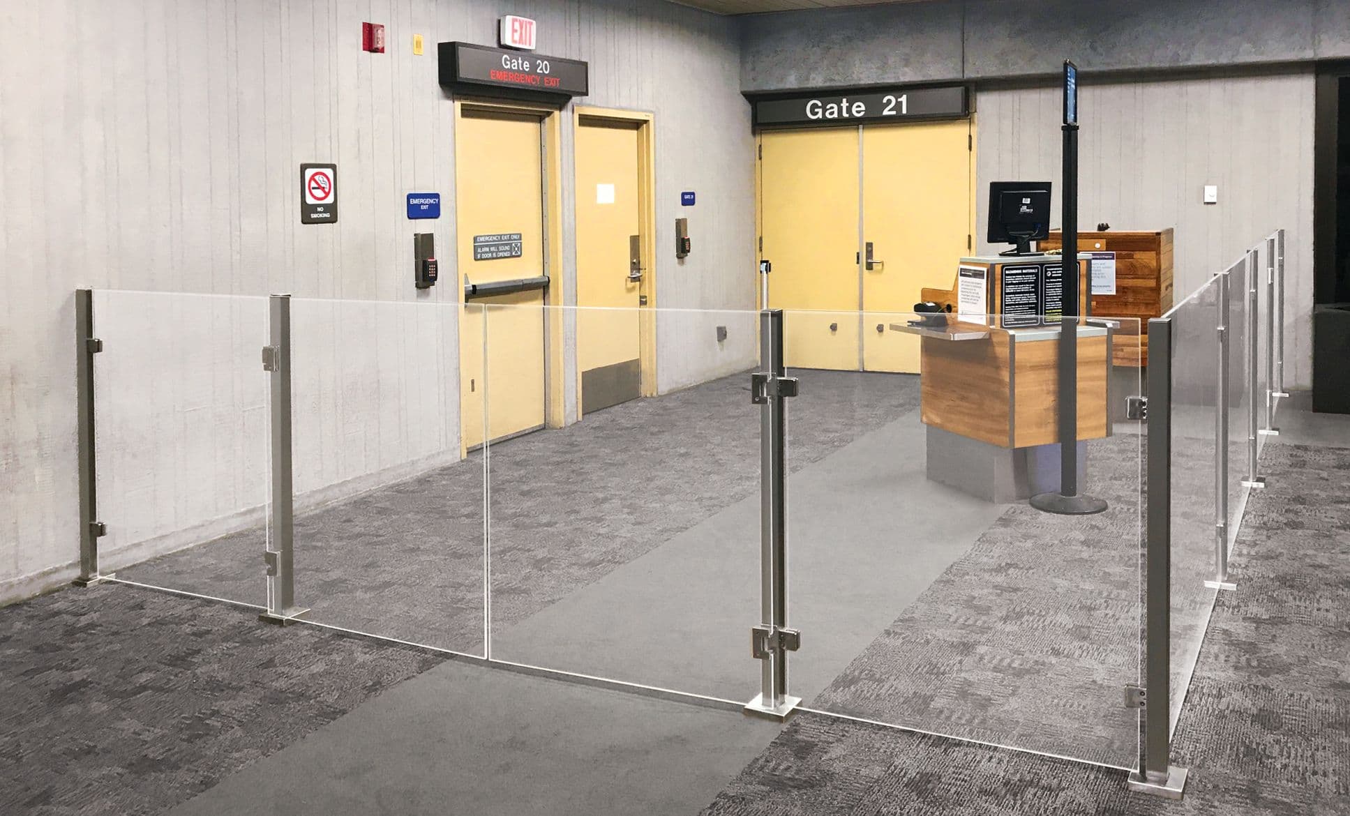 An Architectural Partition Wall secures the boarding gate entrance at a Hawaiian Airlines gate.