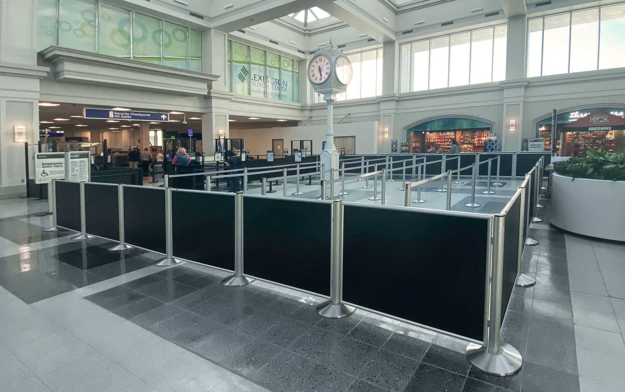 Post and Panel barriers form a hardened perimeter around the security queue at Columbia Metropolitan Airport.