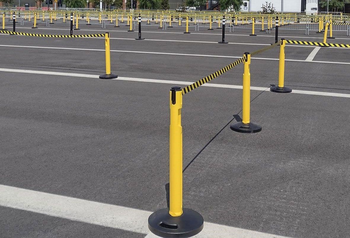 Tempest plastic outdoor stanchion in a parking lot