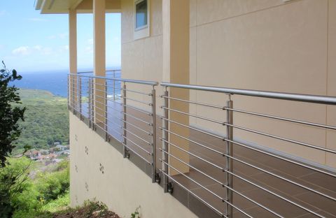 Cross Bar Railing in 316-grade stainless steel on an outside balcony