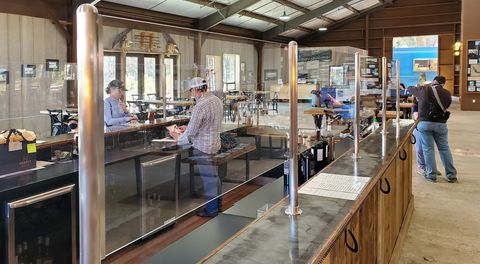 Glass divider posts on the service counter at the Hearst Ranch Winery, California