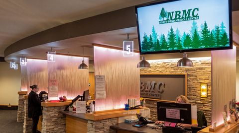 A Lavi electronic queuing system with ceiling mounted station lights at the North Bend Medical Center, Oregon.