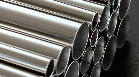 A stack of polished stainless steel tubing