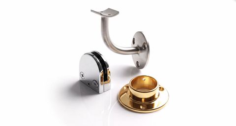 An assortmant of railing components and fittings in brass and stainless steel