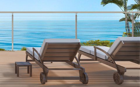 Square post C.A.T. cable rail system on a deck overlooking the ocean