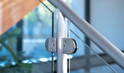 Close up of stainless steel glass grip handrail