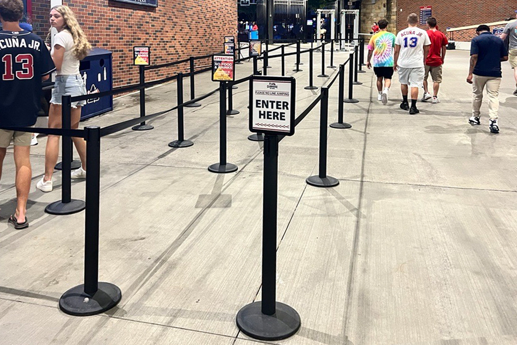 A concession waiting with a long line of stanchions