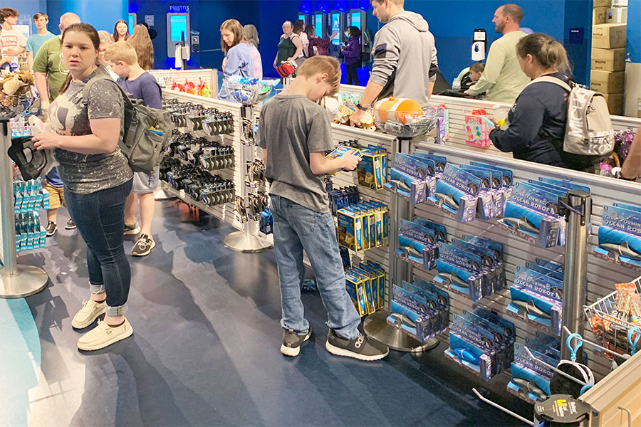 Customers shopping while they wait in line for checkout
