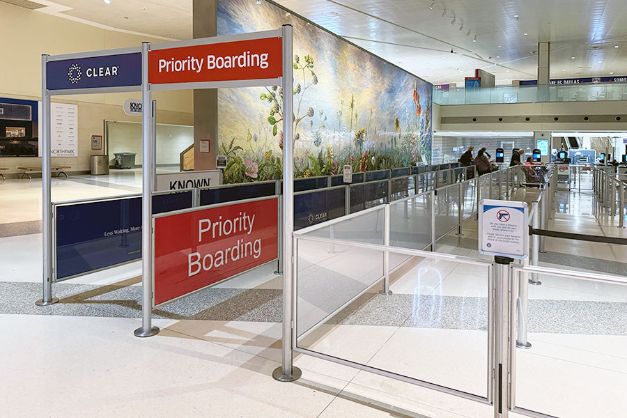 Overhead wayfinding signage at an airport