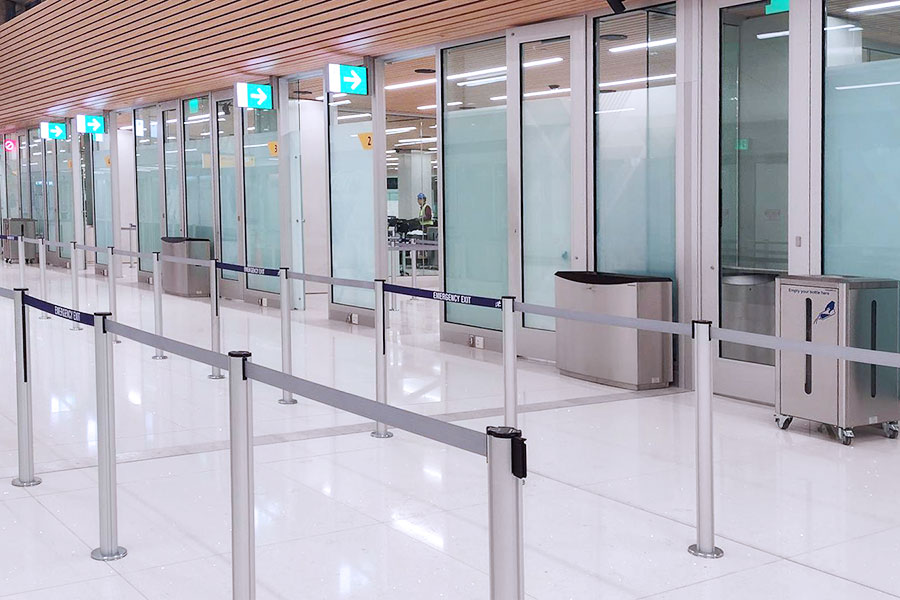 Denver Airport waiting line with magnetic stanchions