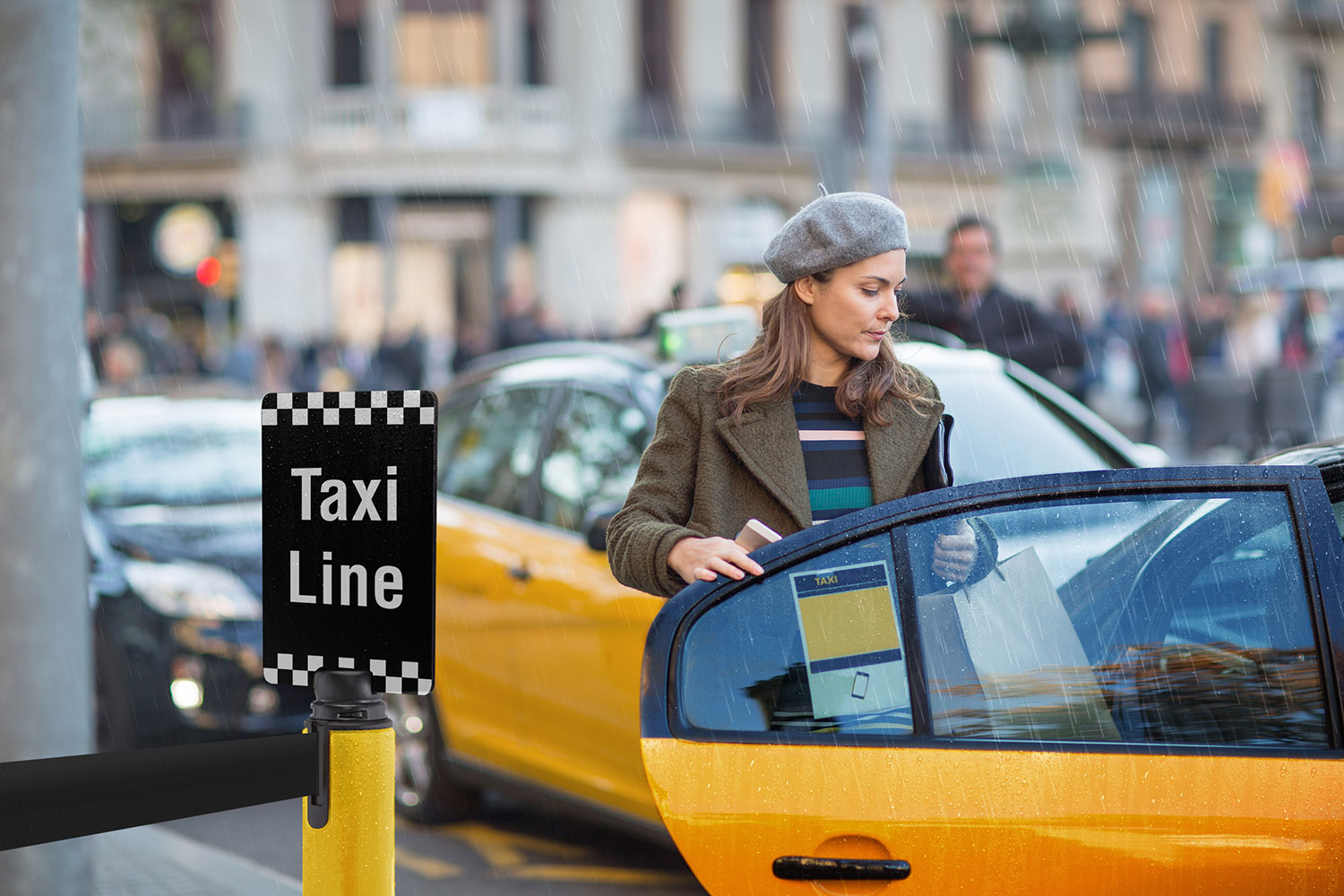 Taxi queue featuring Tempest outdoor stanchion and signage